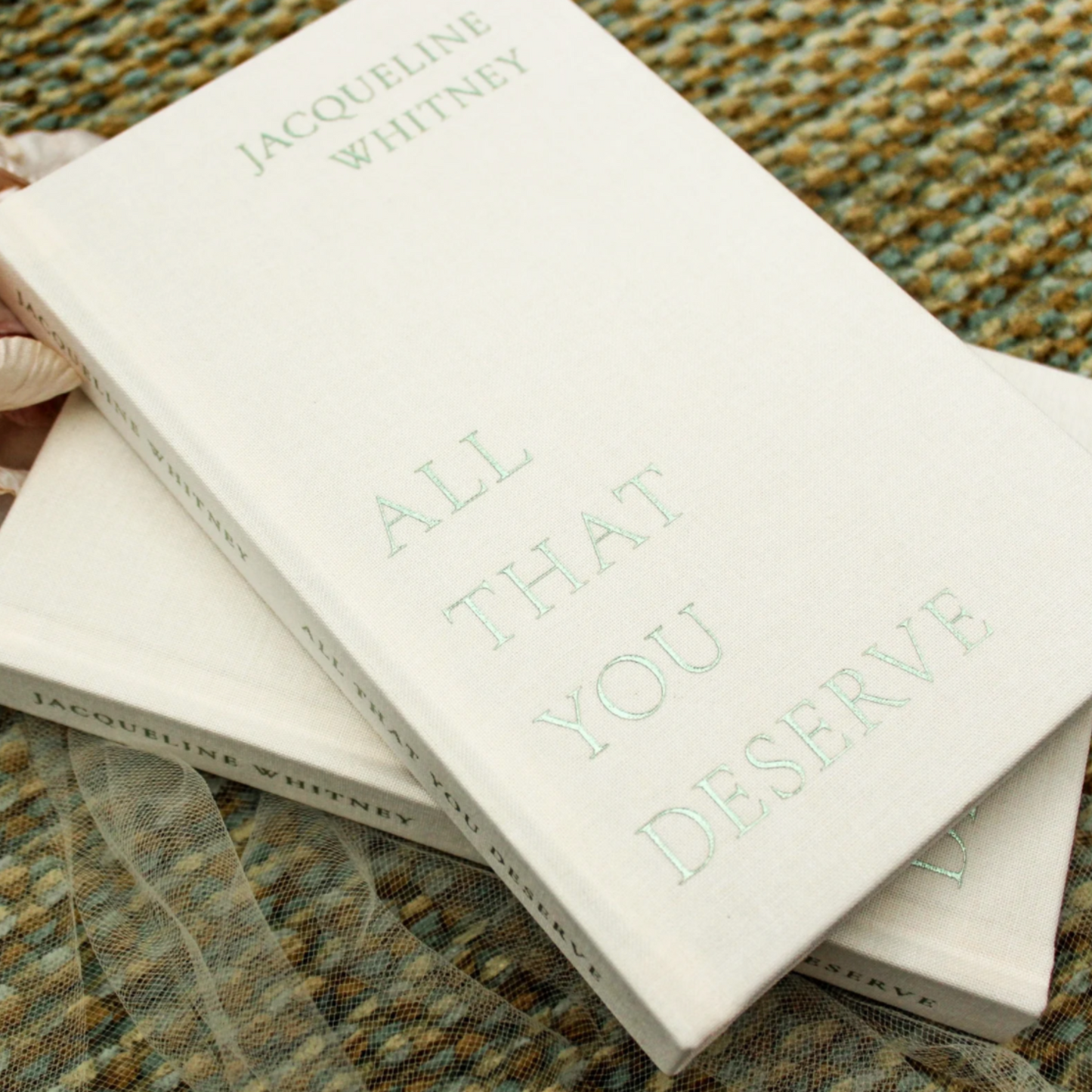 Discover the empowering and heartfelt words of Jacqueline Whitney in 'All That You Deserve,' a beautifully crafted hardcover book published by Thought Catalog. This inspiring collection of poetry and prose offers readers a journey of self-discovery, healing, and self-love. Perfect for those seeking comfort, motivation, and a reminder that they deserve the best in life. Order your copy of 'All That You Deserve' today and immerse yourself in words that resonate deeply with your soul. 176 pages