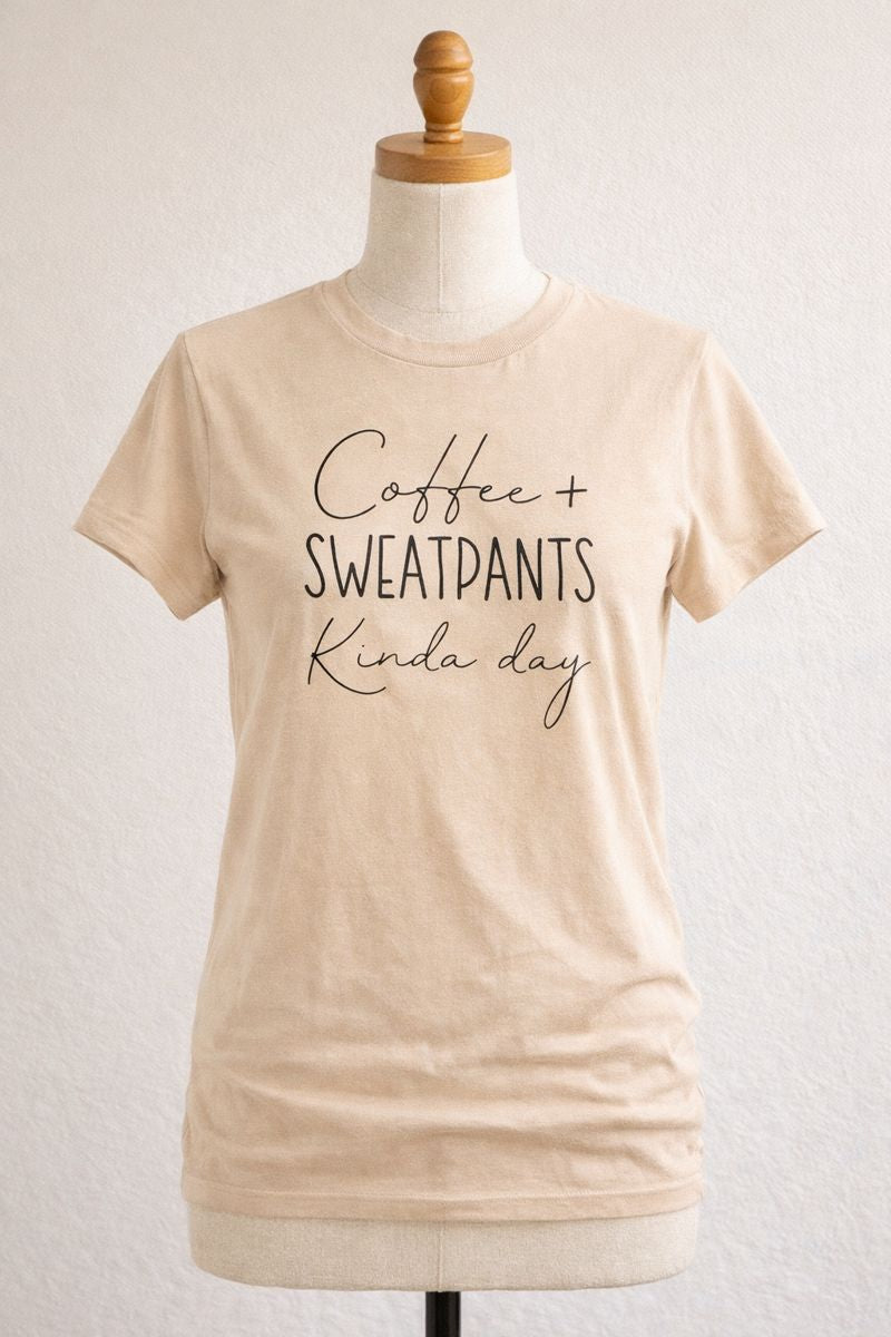 Beige t-shirt with text on a mannequin against a white background