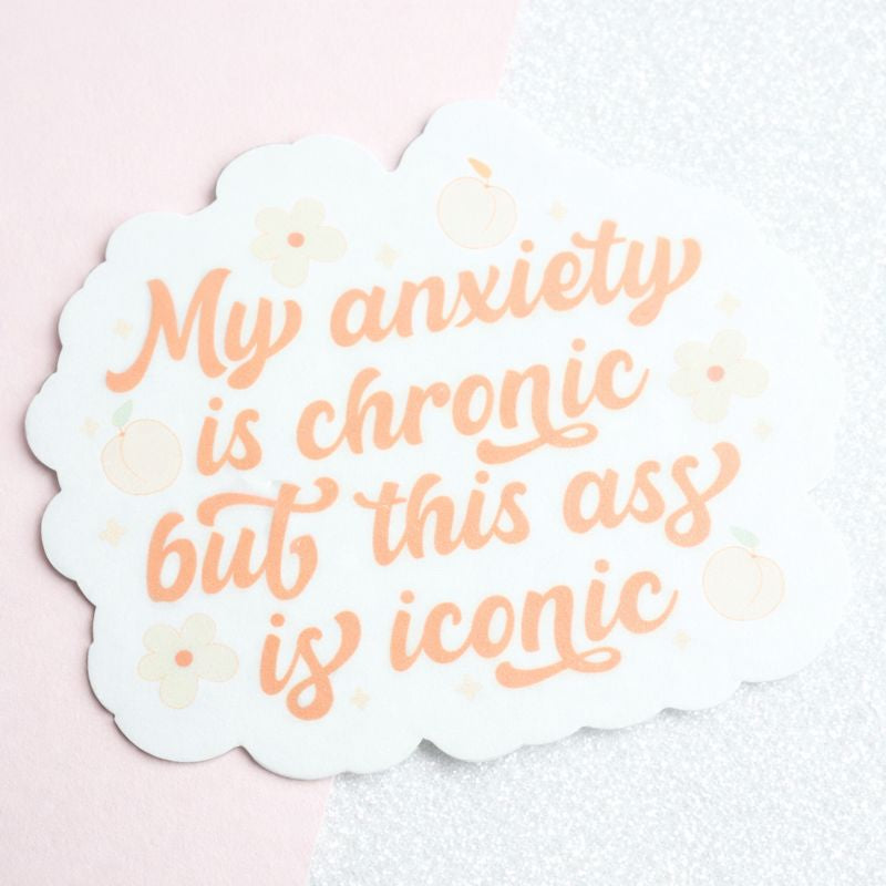 Sticker with text 'My anxiety is chronic but this ass is iconic' on a textured background