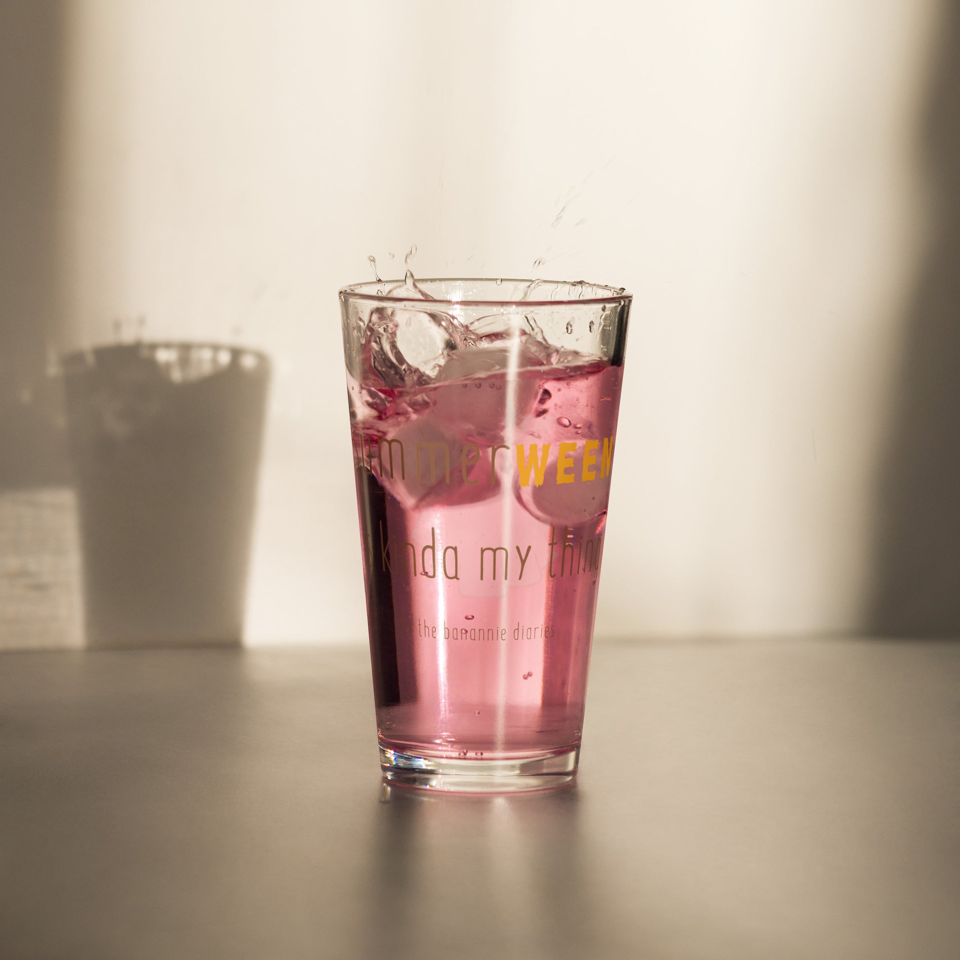 Sip in Style This Summer! Introducing the Summerween Is Kinda My Thing Pint Glass by The Banannie Diaries – your go-to for cold, refreshing drinks with a spooky twist! 🍹👻  - Material: Glass - Volume: 16 oz (473 ml)