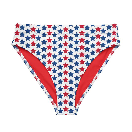 Discover the Red, White, And Stars Recycled High-Waisted Bikini Bottom, crafted for both comfort and sustainability. This eco-conscious design features a double-layered construction for added support and a flattering silhouette. Pair it seamlessly with our matching top for a coordinated beach ensemble or a laid-back day at the spa.  - Double-layered for extra support - Tear-away care label